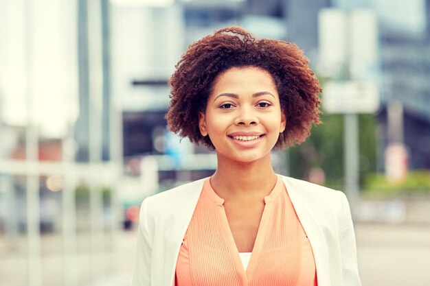 business-people-concept-young-smiling-african-american-businesswoman-city_380164-140821